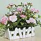 Silk Flowers: Pink Roses in a White Trough